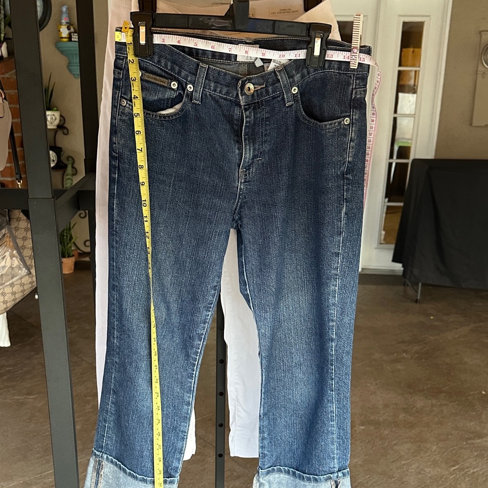 Calvin Klein Jeans Dark Blue Flare Denim with cuff size 6 , will fit 8